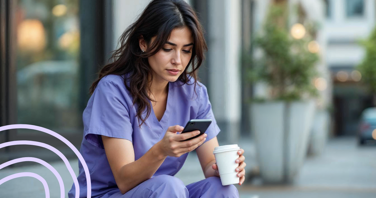 Nurse managing their money on their phone during break.