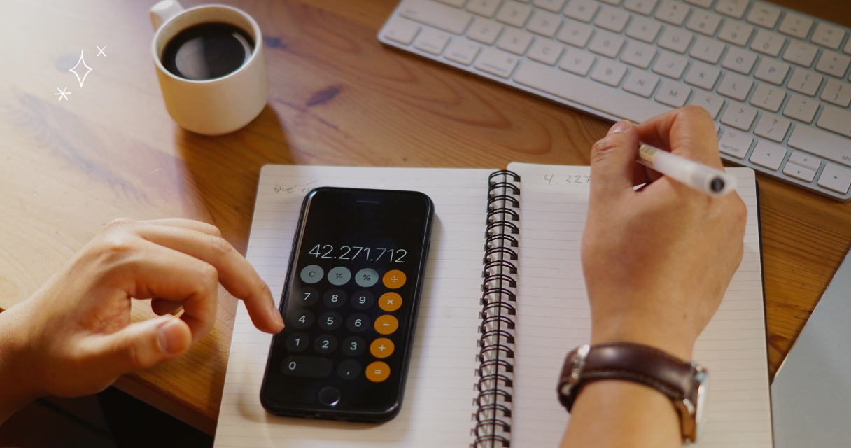 Person calculating loan payments with smartphone and notepad, planning payroll-linked loan repayments with focus and clarity for How to Calculate Payroll-Linked Loan Repayments .